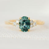 oval green teal sapphire ring