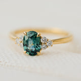 oval green teal sapphire ring
