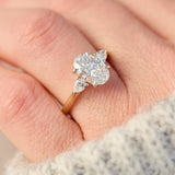 oval lab grown diamond yellow gold and platinum engagement ring