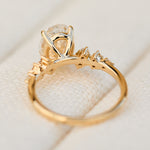 oval lab grown diamond yellow gold engagement cluster ring