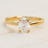 oval lab grown diamond yellow gold engagement ring