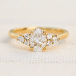 oval lab grown diamond engagement ring set in 18ct yellow gold