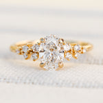 oval lab grown diamond engagement ring set in timeless yellow gold