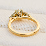 oval lab grown diamond engagement ring set in 18ct yellow gold