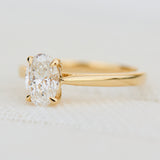 oval lab grown diamond engagement ring in yellow gold