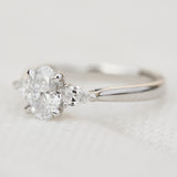 oval lab grown diamond trilogy engagement ring in platinum