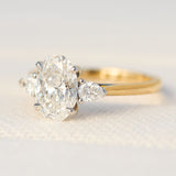 oval lab grown diamond yellow gold and platinum engagement ring
