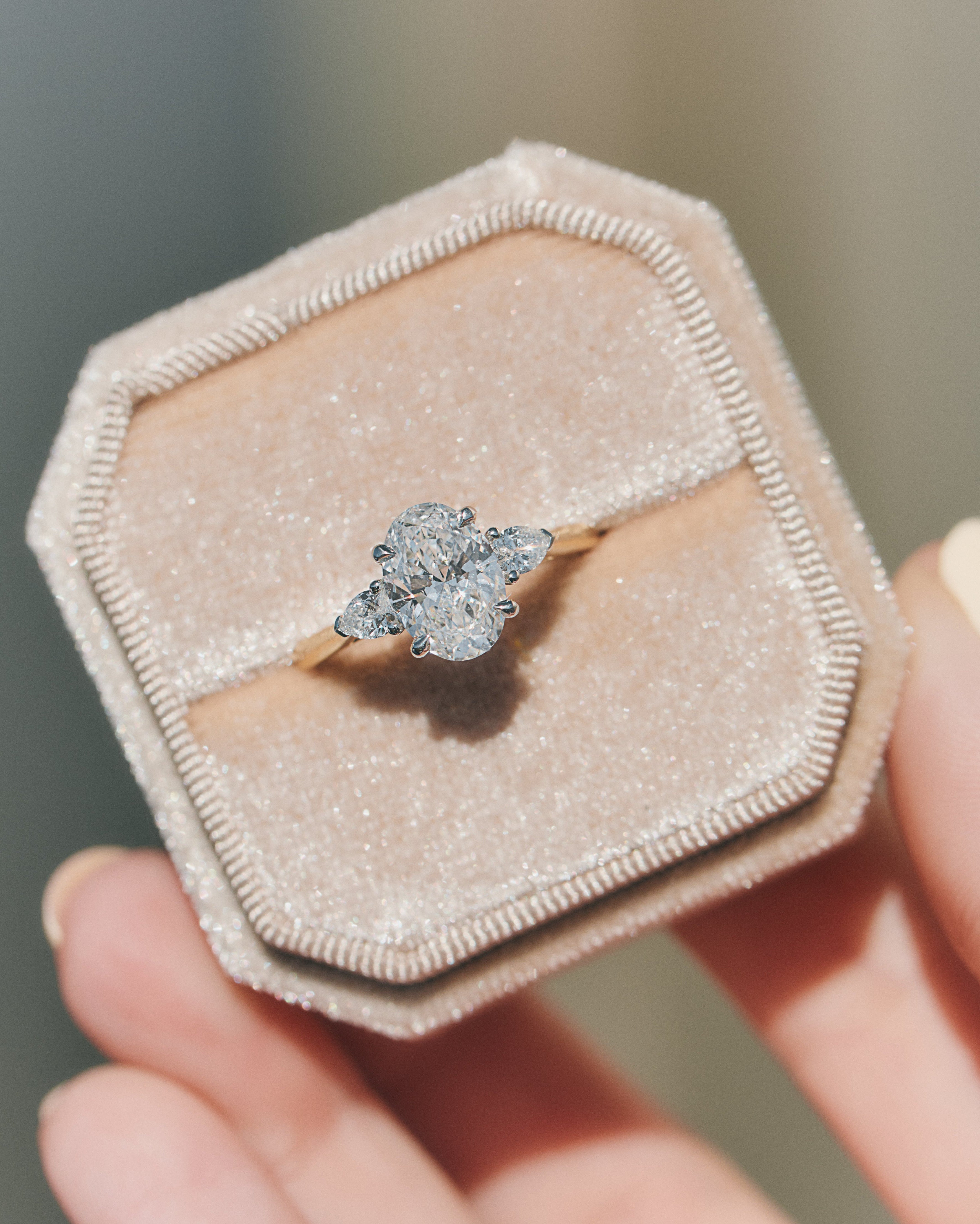 oval lab grown diamond yellow gold and platinum engagement ring