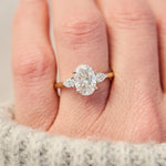 oval lab grown diamond yellow gold and platinum engagement ring