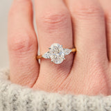 oval lab grown diamond yellow gold and platinum engagement ring