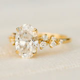 oval lab grown diamond yellow gold engagement cluster ring