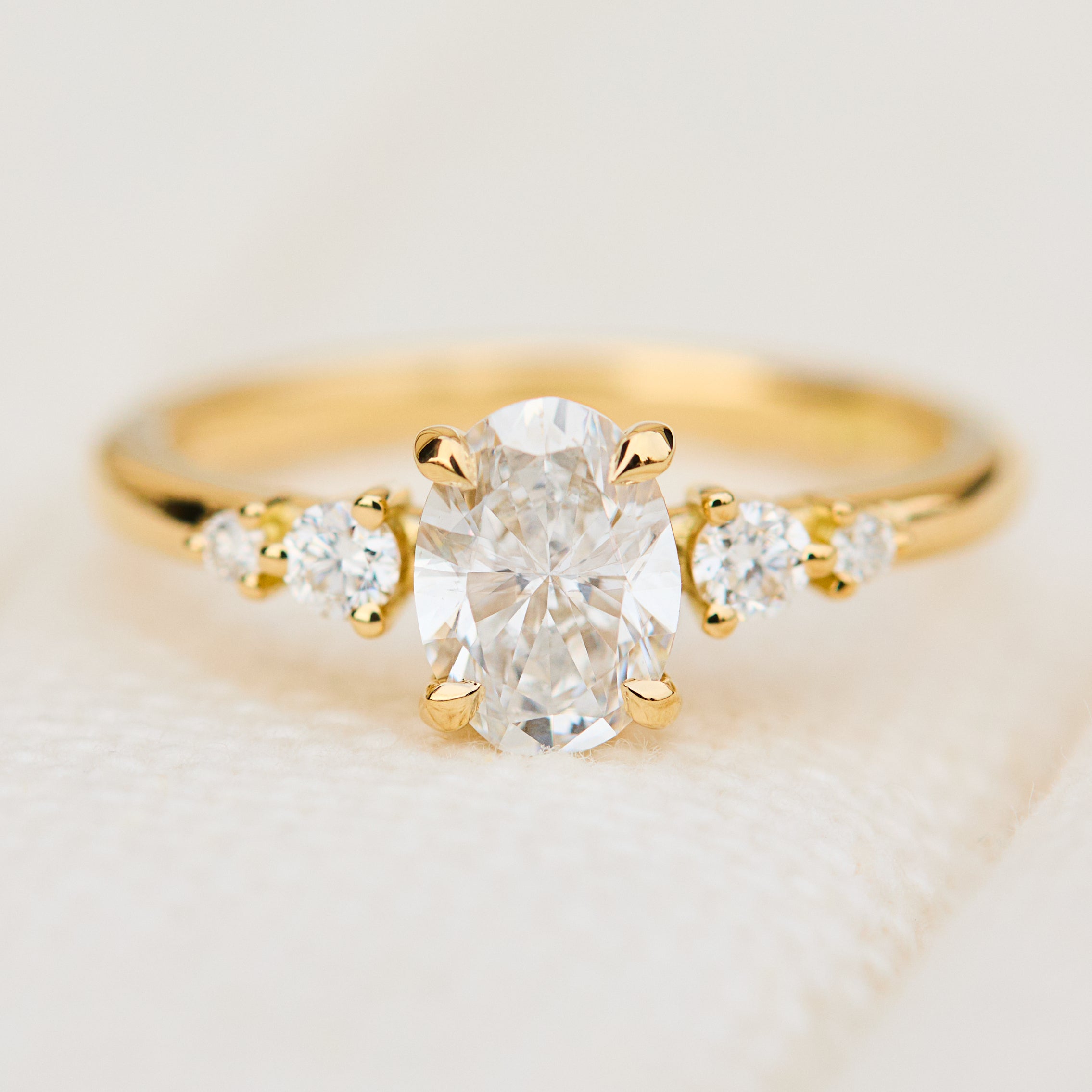oval lab grown diamond yellow gold engagement ring uk