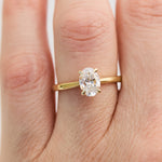 oval lab grown diamond yellow gold engagement ring