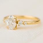 oval lab grown diamond yellow gold engagement ring uk