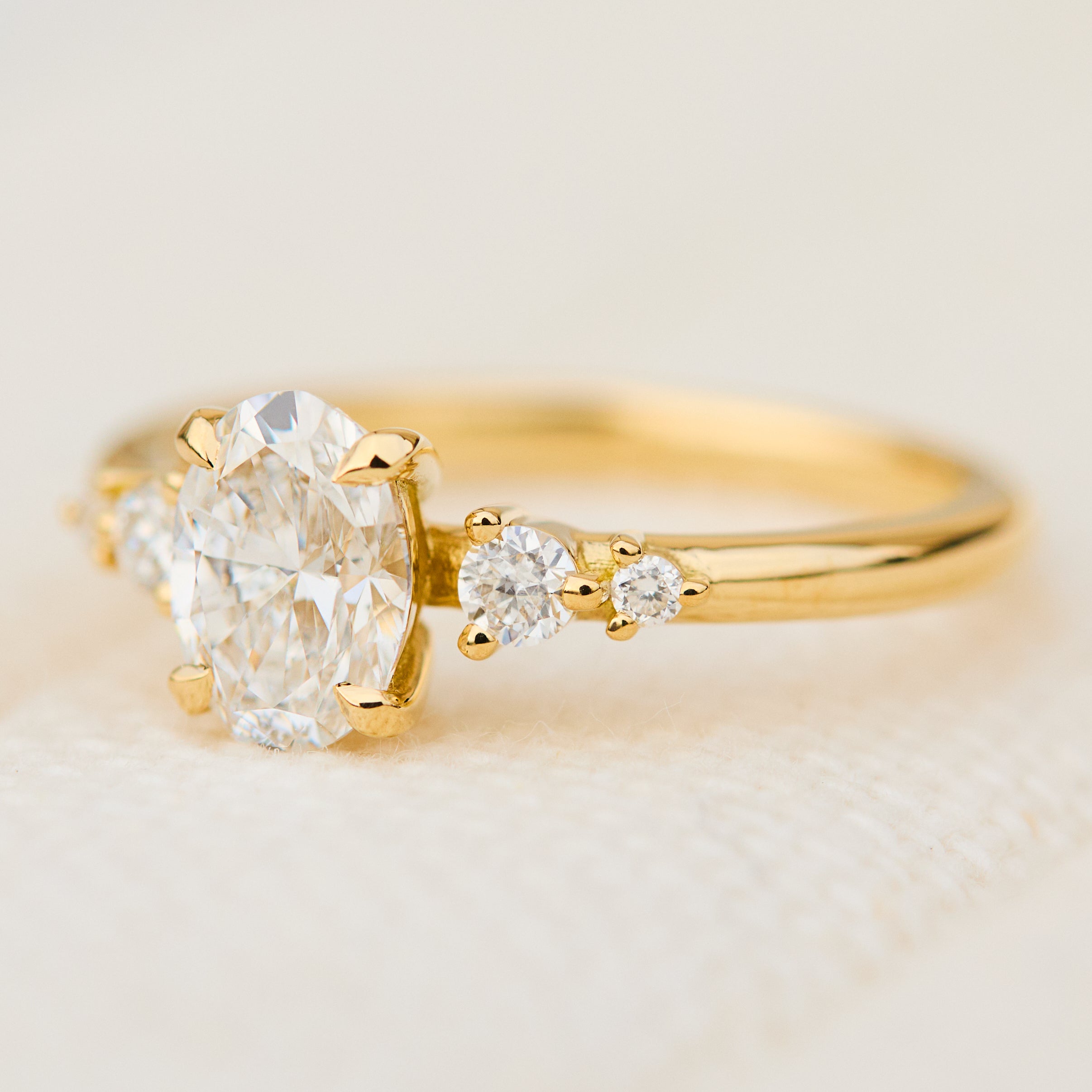 oval lab grown diamond yellow gold engagement ring uk