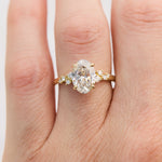 oval lab grown one of a kind diamond engagement ring set in yellow gold