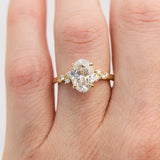 oval lab grown one of a kind diamond engagement ring set in yellow gold