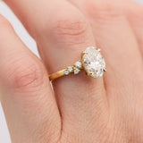 oval lab grown one of a kind diamond engagement ring set in yellow gold