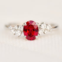 oval lab grown ruby engagement ring in platinum