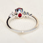 oval lab grown ruby engagement ring in platinum