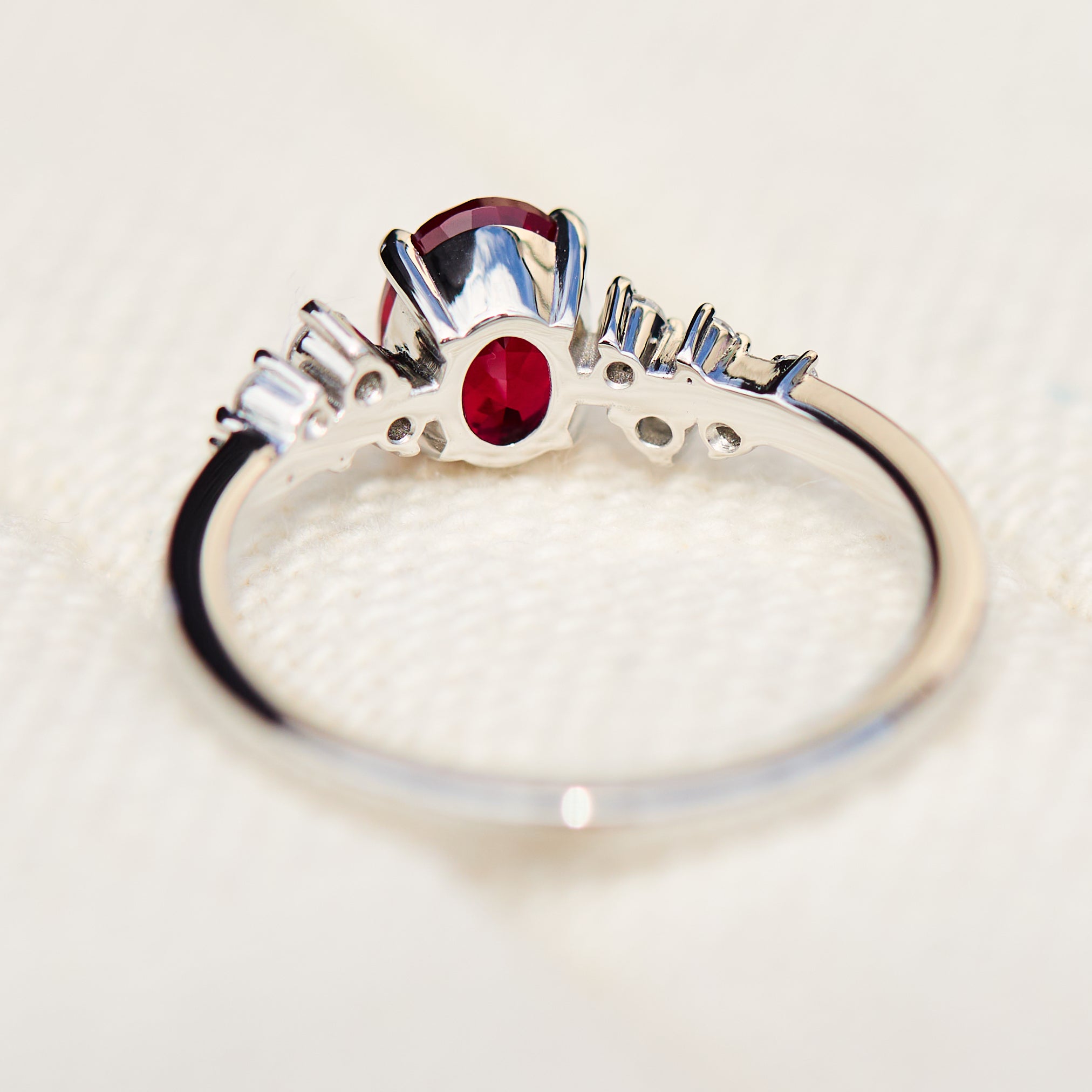 oval lab grown ruby engagement ring in platinum