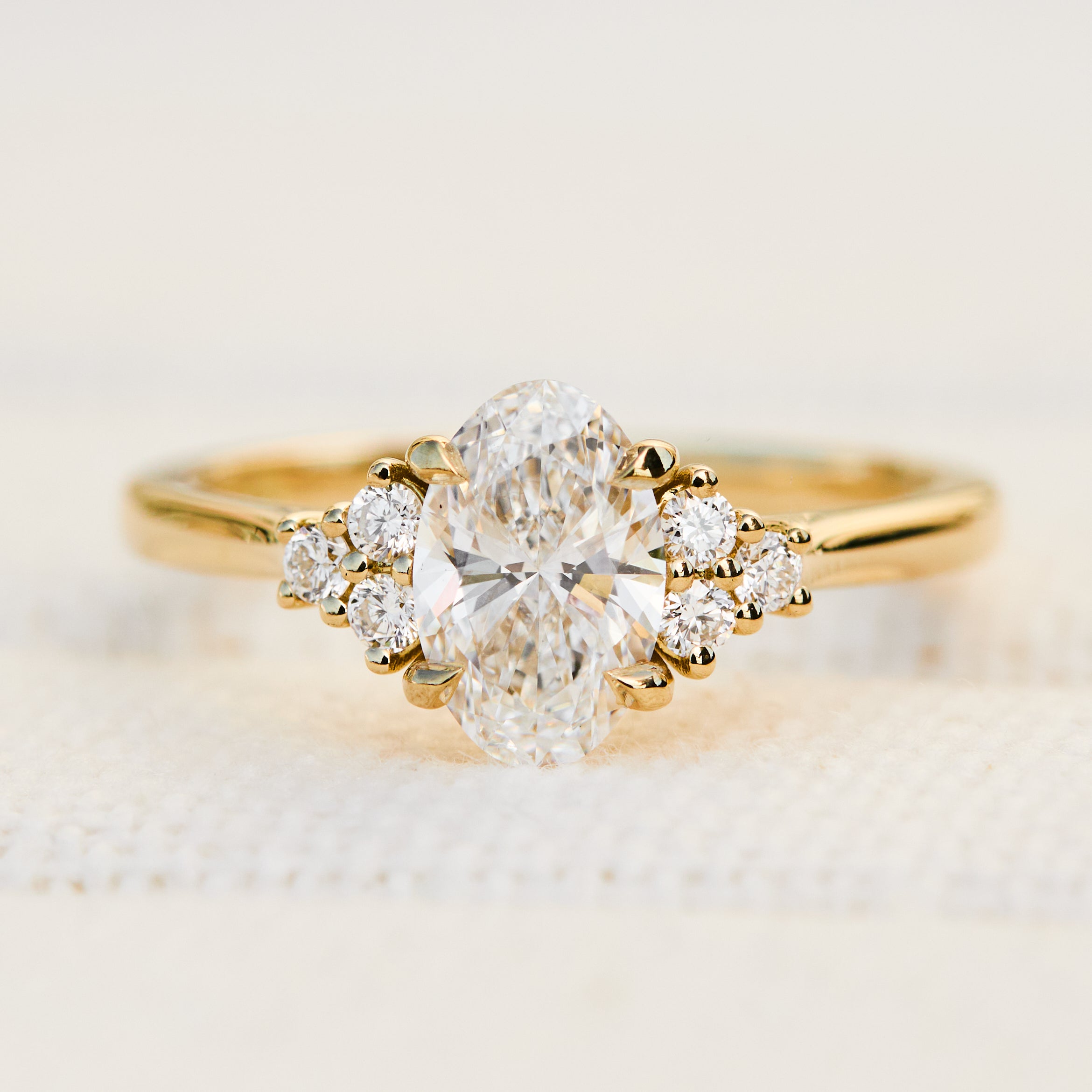 oval lab grown trefoil diamond yellow gold engagement ring