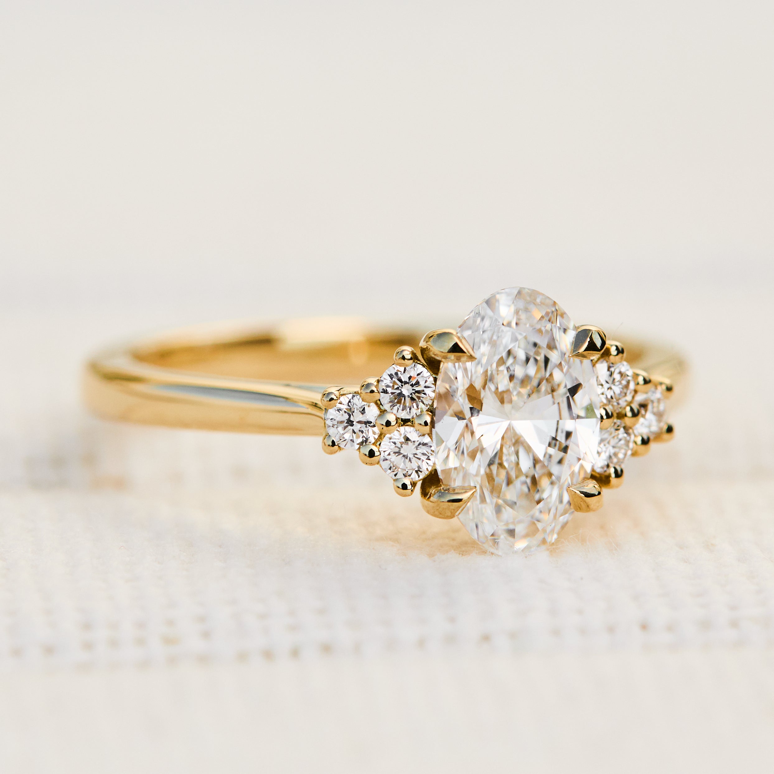 oval lab grown trefoil diamond yellow gold engagement ring