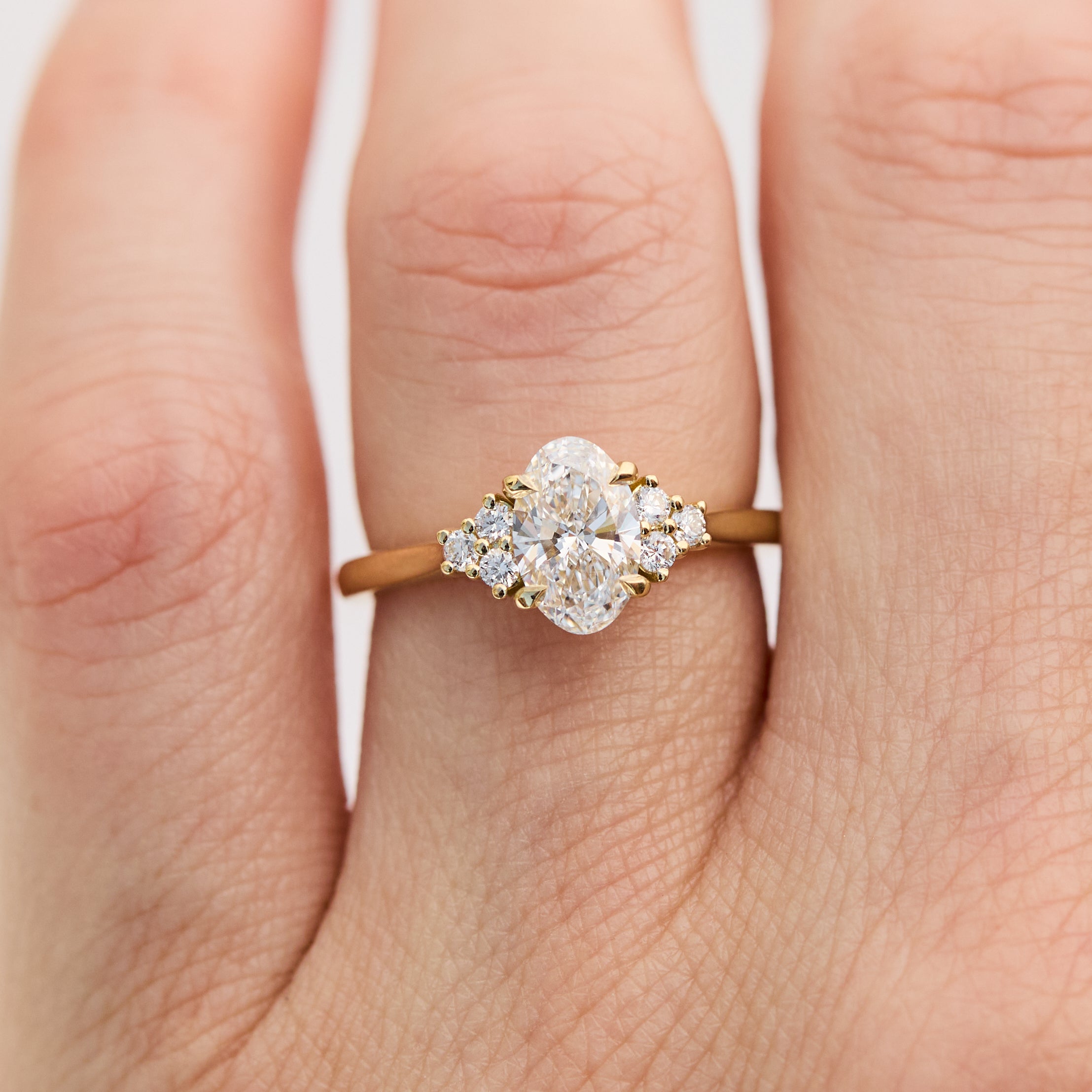 oval lab grown trefoil diamond yellow gold engagement ring