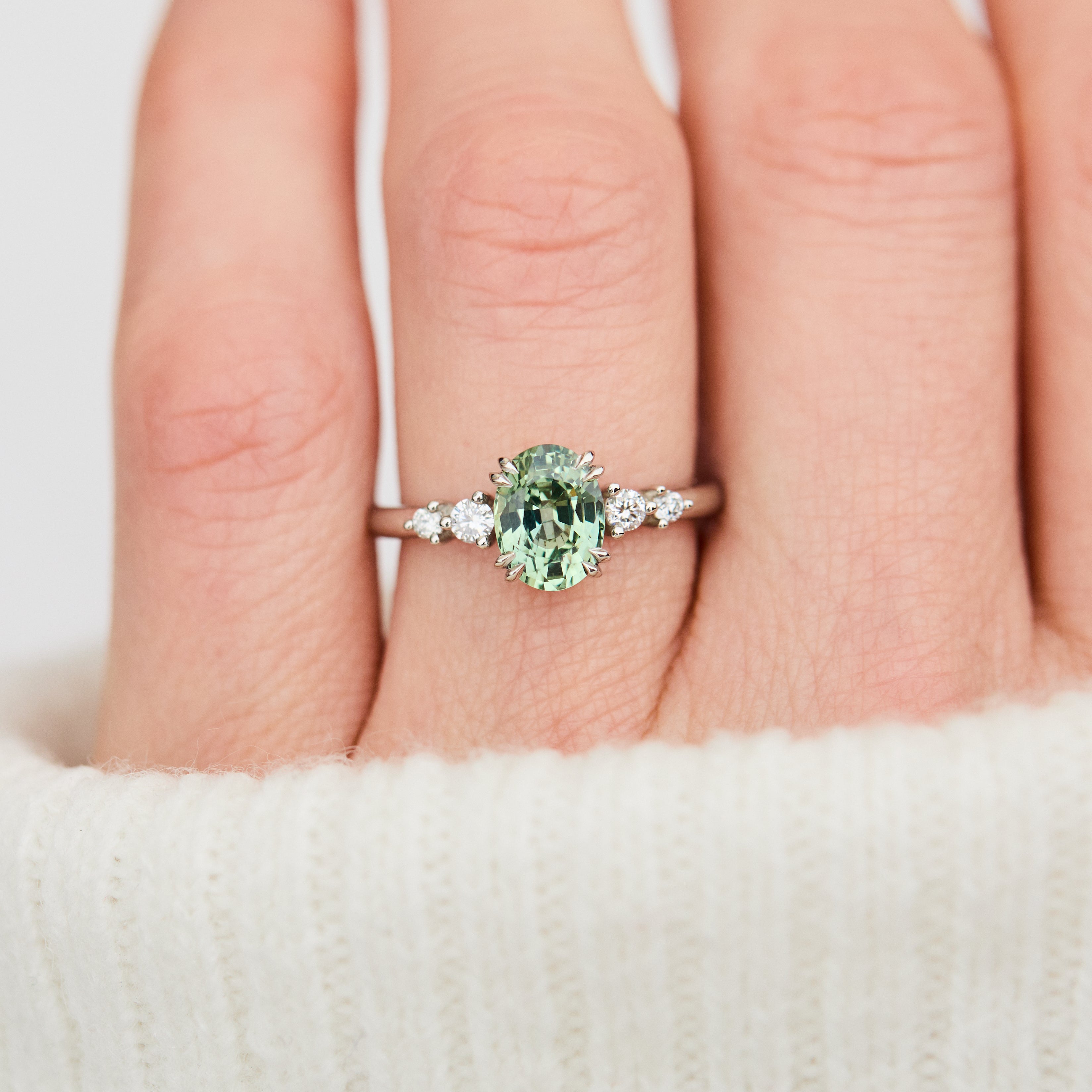 oval mint green montana sapphire engagement ring set in platinum