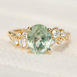 oval mint green sapphire yellow gold engagement ring