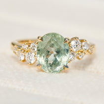 oval mint green sapphire yellow gold engagement ring