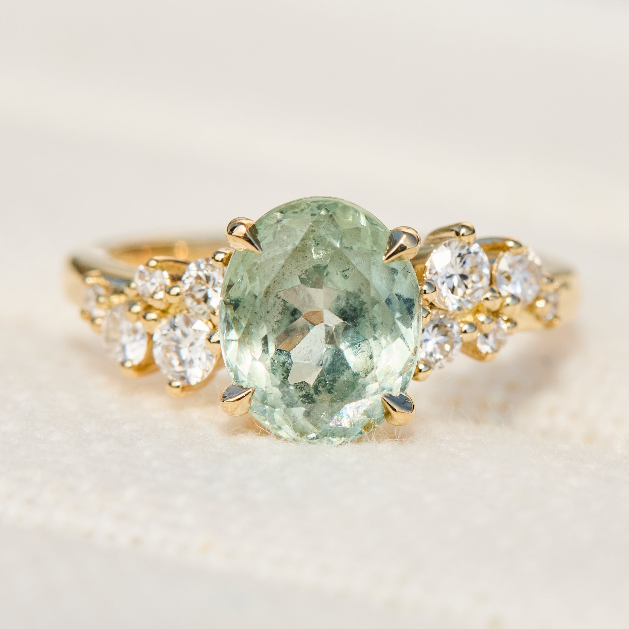 oval mint green sapphire yellow gold engagement ring
