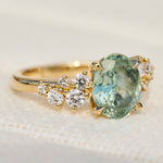 oval mint green sapphire yellow gold engagement ring