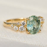 oval mint green sapphire yellow gold engagement ring