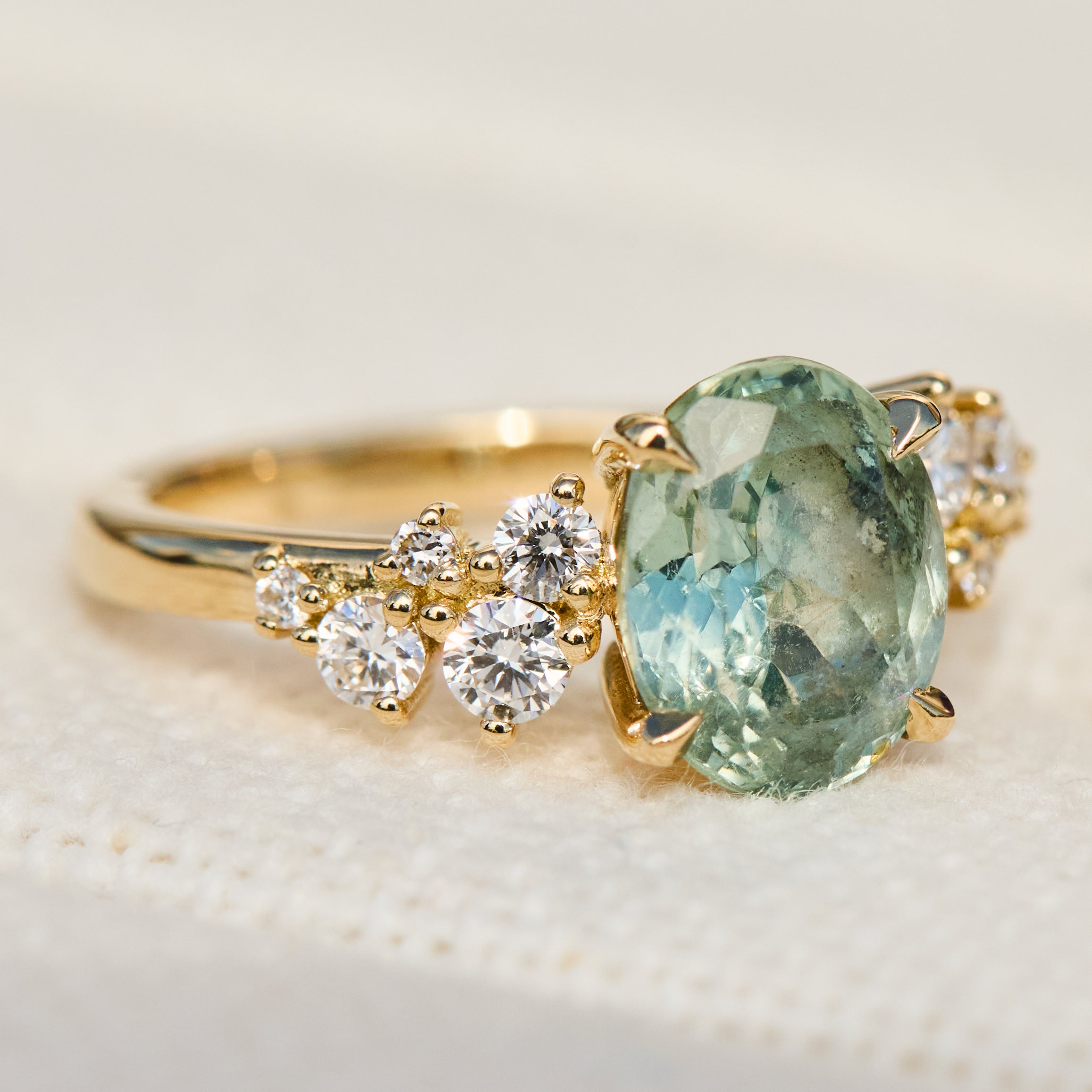 oval mint green sapphire yellow gold engagement ring