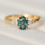 oval montana sapphire trilogy engagement ring