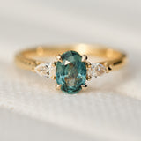 oval montana sapphire trilogy engagement ring