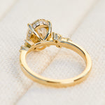 oval lab grown one of a kind diamond engagement ring set in yellow gold