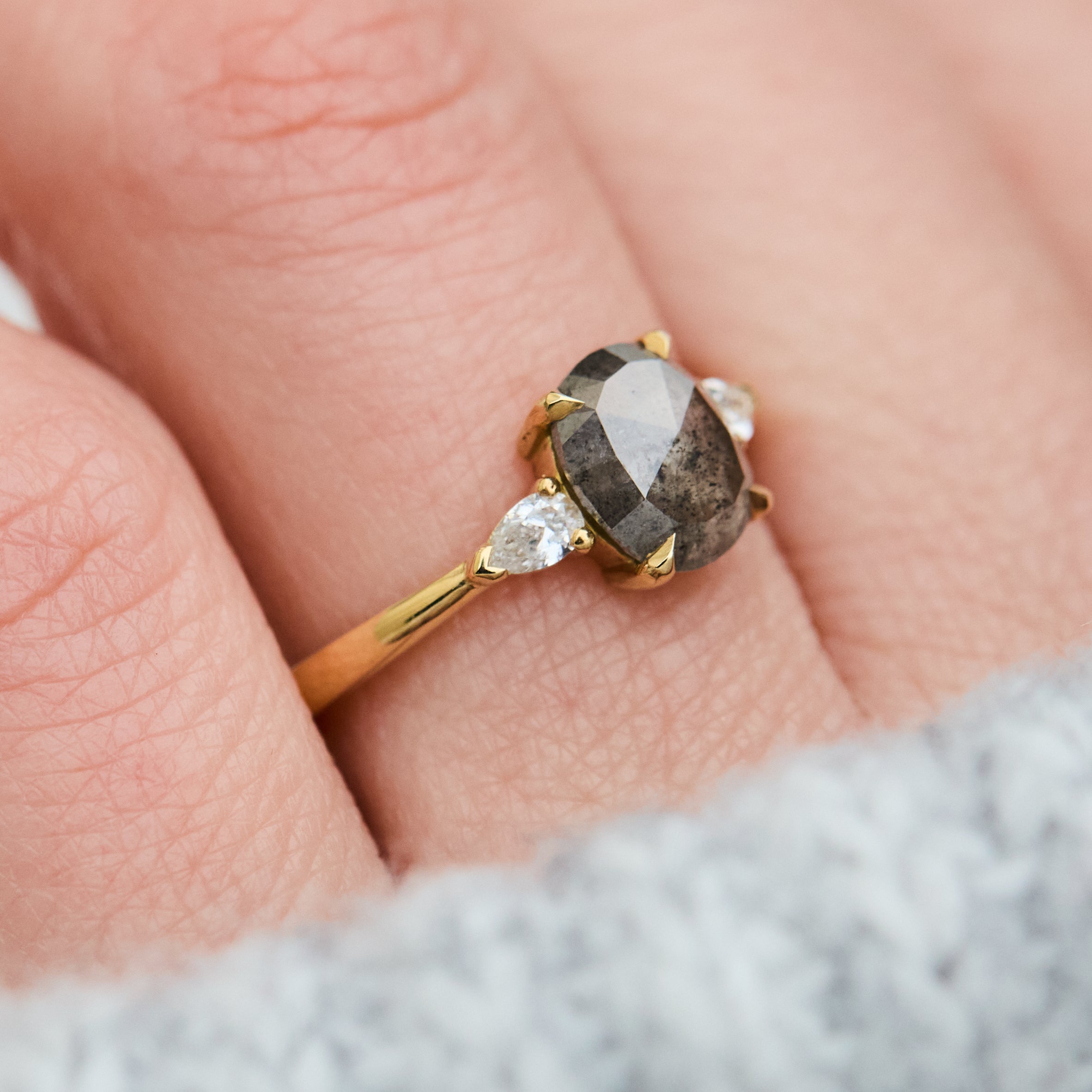 oval rose cut salt and pepper diamond engagement trilogy ring in yellow gold