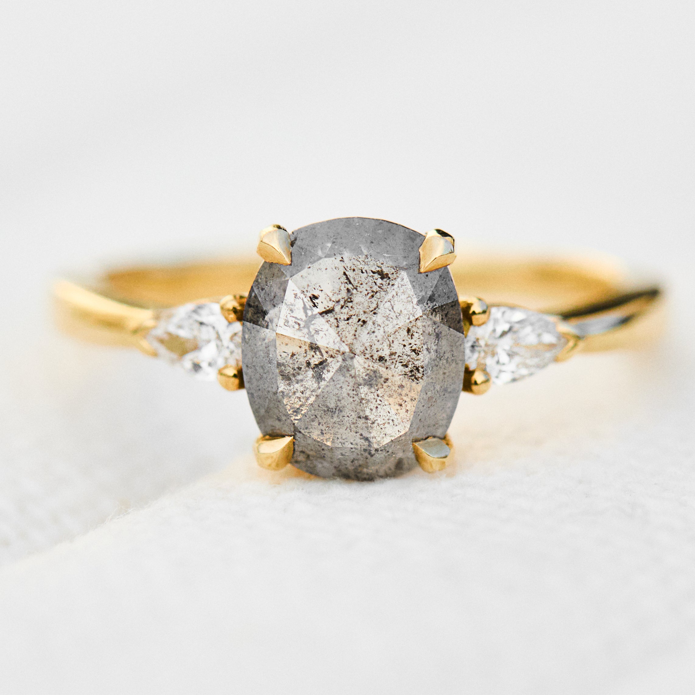 oval rose cut salt and pepper diamond engagement trilogy ring in yellow gold