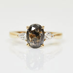 18ct yellow gold salt and pepper oval diamond engagement trilogy ring