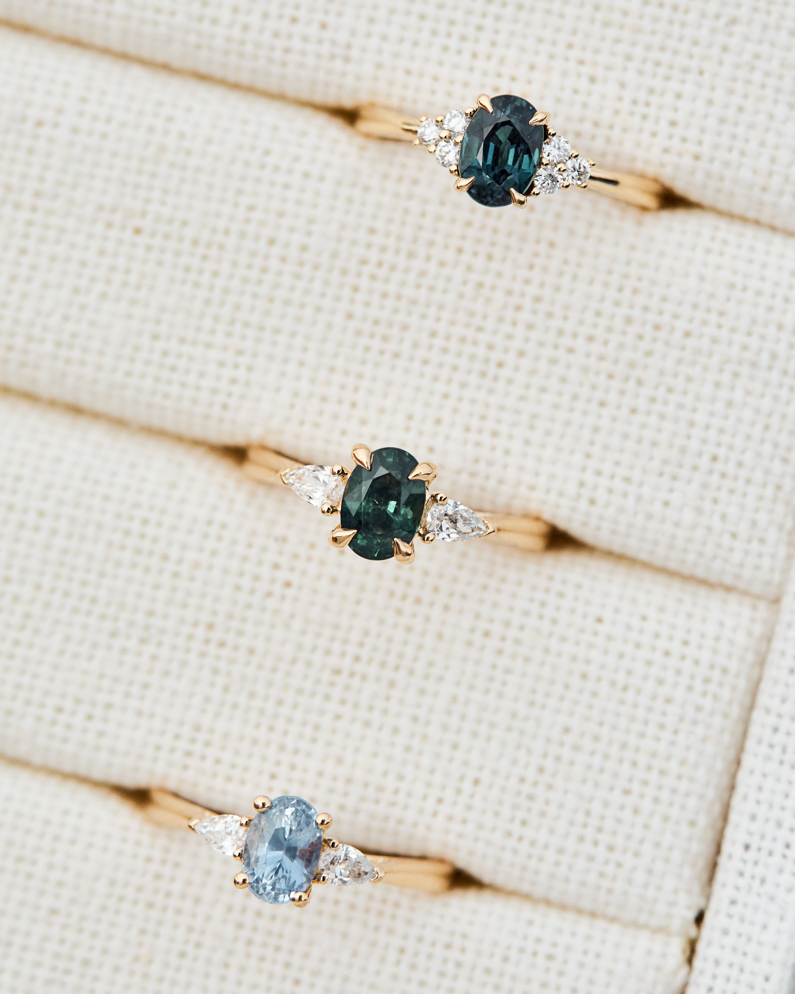 oval sapphire engagement rings in yellow gold