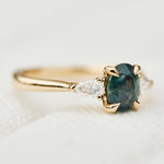 oval sapphire luna setting engagement ring in yellow gold