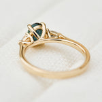 oval sapphire luna setting engagement ring in yellow gold