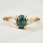 oval sapphire luna setting engagement ring in yellow gold