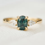 oval sapphire luna setting engagement ring in yellow gold