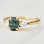 oval sapphire luna setting engagement ring in yellow gold