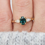 oval sapphire luna setting engagement ring in yellow gold