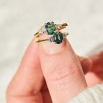 oval sapphire trilogy yellow gold engagement rings