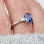oval sri lankan blue sapphire trilogy platinum engagement ring